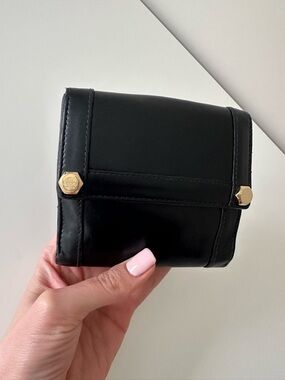 Gucci leather wallet with gold nut studs